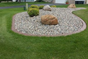 Before and After photos of landscaping / concrete curbing jobs completed by Unique Curbing